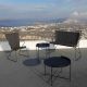 Banc outdoor et fauteuil lounge avec coussin PAON et tables EDGE Houe