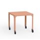 Table carrée outdoor à roulettes HEGOA Matière Grise, coloris orange givrée